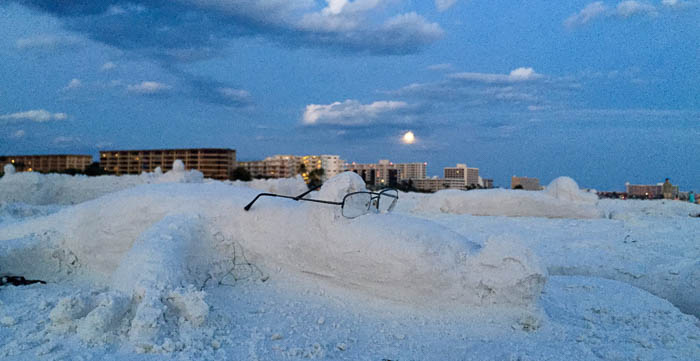 Alligator (or crocodile?) sand sculpture at moonrise on Siesta Key