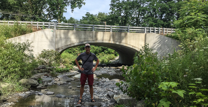 Chris in Eggleston Glen with the Route 54 bridge right behind him