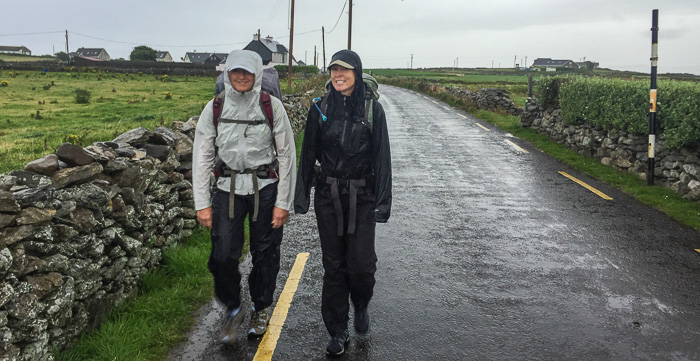 Karen and Julie setting out on a very wet hike from Fahamore to Camp
