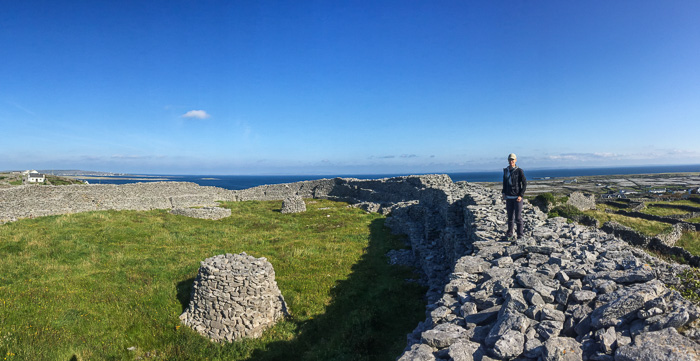 Julie on the top wall of Dun Chonchuir on Inishmaan