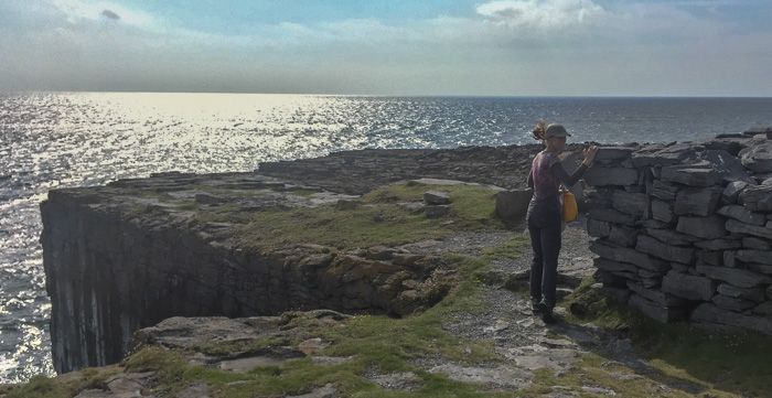 Julie rounding the corner to enter Dun Duchathair, the Black Fort. Watch your step - it's just a few feet to a looong drop!