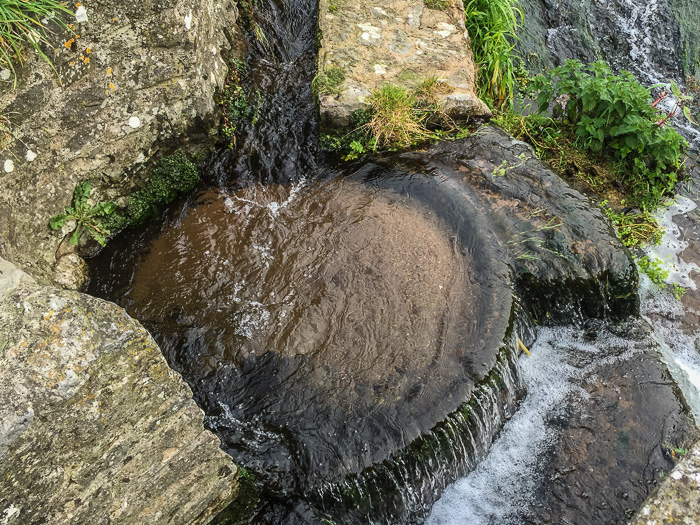 Carved stone basin in the river by the Glanworth Mill