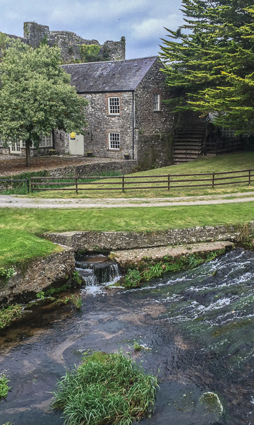This photo has it all! The River Funcheon with stone basin and weir, the mill and water wheel, and the Glanworth Castle in the background, peeking over the mill.