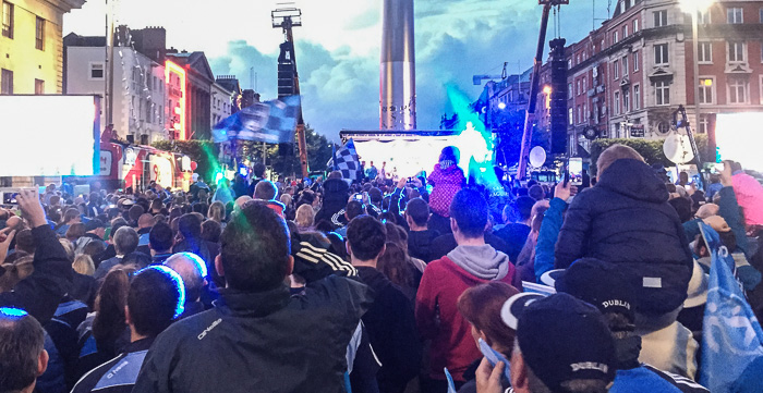 Fans cheer for their team at the "Up the Dubs" rally on O'Connell Street