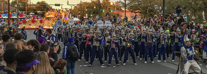 Near the start of Endymion. A marching band strutting its stuff, and floats rounding the corner in the background.