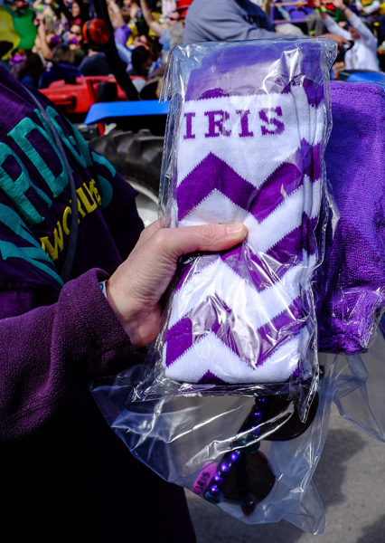 Ooooh, great throws! The folks next to us snagged these top-quality goodies from a friend riding in the Krewe of Iris parade.