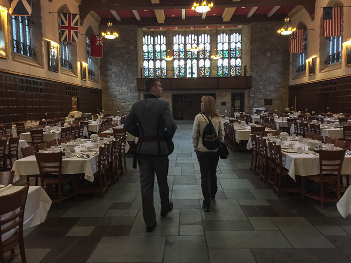 Julie and Matthew strolling in the Cadet Mess, already set for the evening banquet