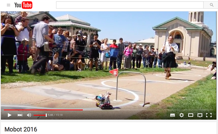 Mobot approaching a gate. This image is a screenshot from the Mobot 2016 video posted on Youtube by cmurobotics.