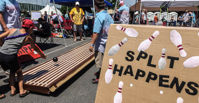 The "Split Happens" cardboard boat doubled as a bowling game prior to the race.