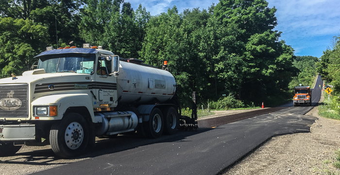 The paving crew working on County Route 113
