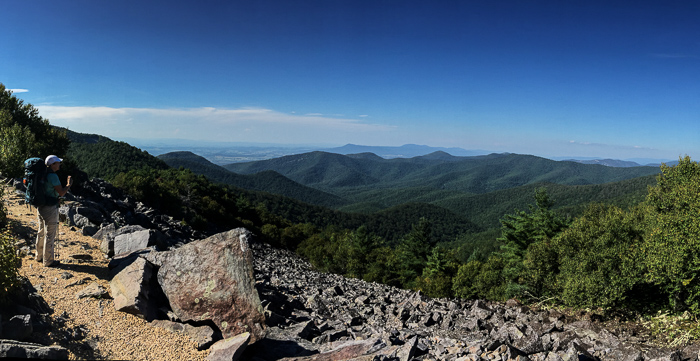 Lynn on the Appalachian Trail as it winds around Blackrock Summit (behind her). One of my favorite spots on the trail.