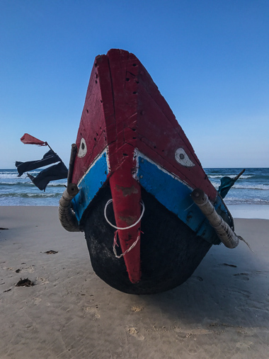 A colorful Vietnamese boat. Love the eyes!