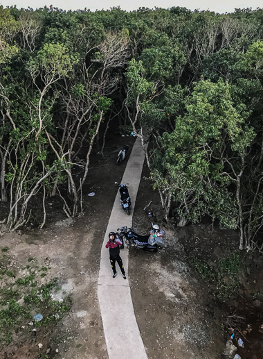 Looking down at Bằng from the top of the viewing tower. Note how narrow the path is - tricky driving for inexperienced motorbikers!