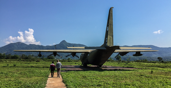 Bằng and Chris walking out to the C-130 at the Khe Sahn Combat Base.