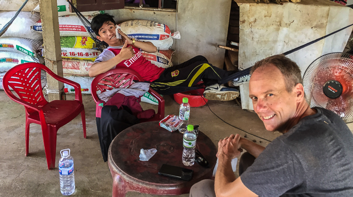 Waiting for lunch and a typical scene: wiping the grime off, sitting in plastic chairs, guzzling water, and cooling off with the help of a small fan. It's certainly not the lap of luxury, but we loved every minute.