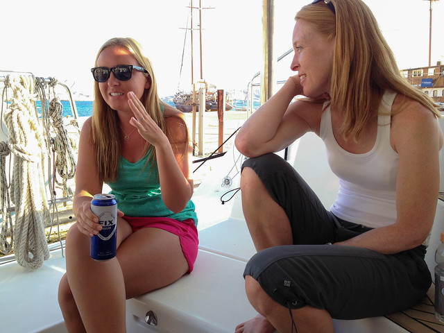 Enjoying a drink on the boat in Mykonos new harbour