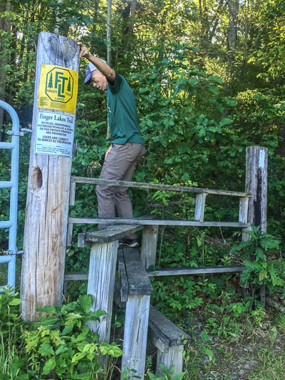 Chris climbing a stile - reminded us of hiking in Ireland!